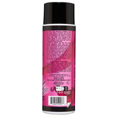 Back view of a cylindrical Manic Panic® LOVE COLOR™ FUCHSIA FEVER CONDITIONER bottle with a label detailing product usage instructions, ingredients, and barcode.