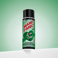 A bottle of Manic Panic® LOVE COLOR™ FOREST NYMPH GREEN® conditioner. The packaging features red and blue graphics with text emphasizing the vegan formulation.