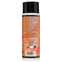 Black cylindrical bottle displaying detailed ingredient information and usage instructions in multiple languages, set against a white background, featuring Manic Panic® LOVE COLOR™ Orane Crush® CONDITIONER.