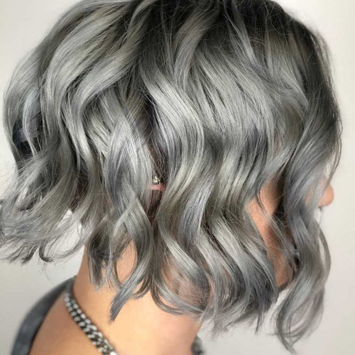 A woman with Alien grey hair color.