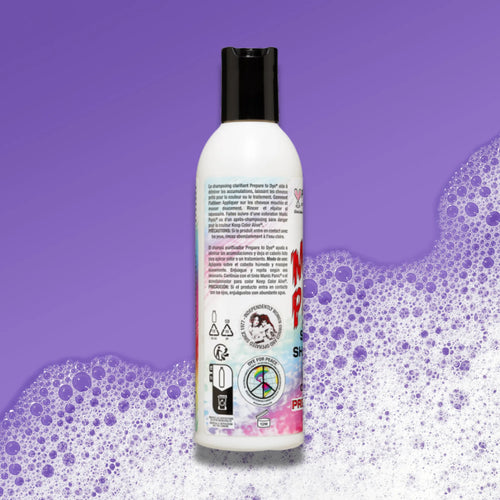 Manic Panic Prepare to Dye  clarifying shampoo bottle bottle with label on a purple background with soap suds