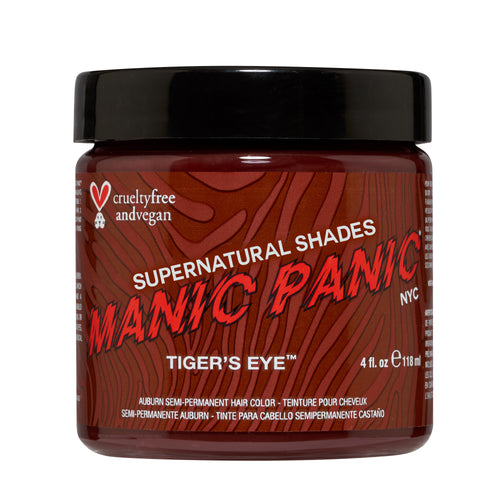 A jar of copper hair color called Tiger's Eye. Manic Panic logo in bold red across the label of the jar. Also featuring the Peta bunny as this product is cruelty free and vegan