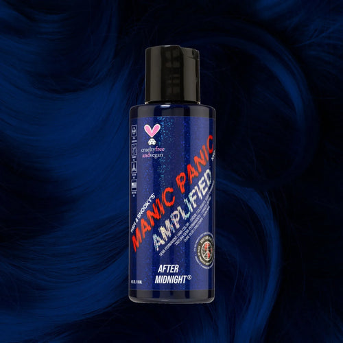 Manic Panic Amplified After Midnight navy blue hair dye bottle on deep blue wavy hair background