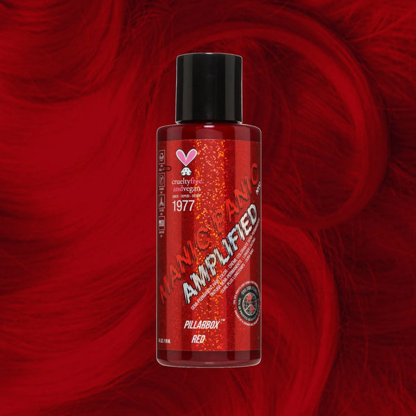 Manic Panic Amplified Pillarbox Red semi-permanent hair dye on vibrant red wavy hair background
