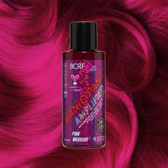 Manic Panic Amplified Pink Warrior bottle on hot pink wavy hair background