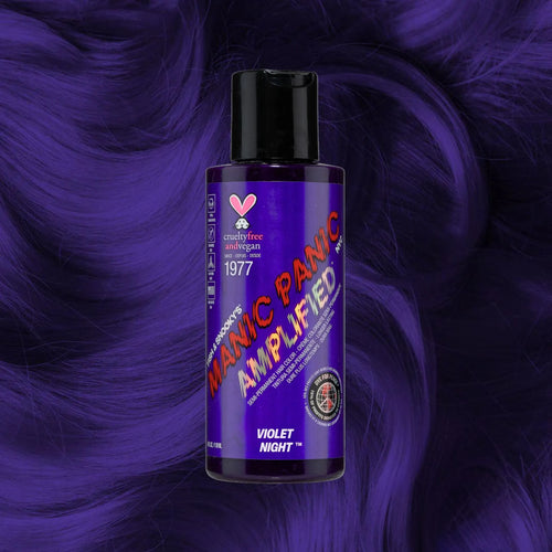 Manic Panic Amplified Violet Night hair dye bottle on deep purple wavy hair background