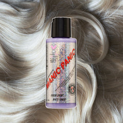 “Manic Panic Amplified Virgin Snow toner bottle on silver-white wavy hair background