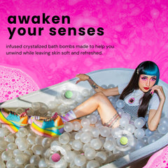 Person relaxing in a bathtub filled with bath bombs against a pink background with text about bath bombs.