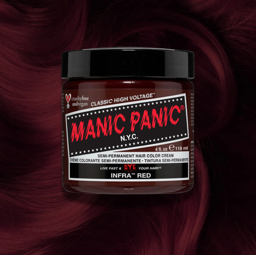 Manic Panic Classic High Voltage semi-permanent hair dye in shade Infra Red a vibrant, vegan hair color. Image shows a jar of Infra Red hair dye placed on top of a wavy infra red hair swatch.
