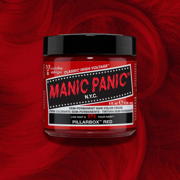 Manic Panic Classic High Voltage semi-permanent hair dye in shade Pillarbox Red a vibrant, vegan hair color. Image shows a jar of Pillarbox Red hair dye placed on top of a wavy pillarbox red hair swatch.
