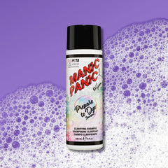 A bottle of PETA Certified Vegan Manic Panic Prepare to Dye Shampoo centered against a purple background with purple and white foam bubbles.