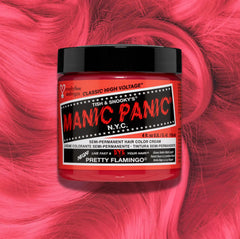 Manic Panic Classic High Voltage semi-permanent hair dye in shade Pretty Flamingo a vibrant, vegan hair color. Image shows a jar of Pretty Flamingo hair dye placed on top of a wavy peachy pink hair swatch.
