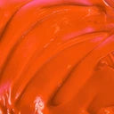 Close-up of orange hair dye swatch