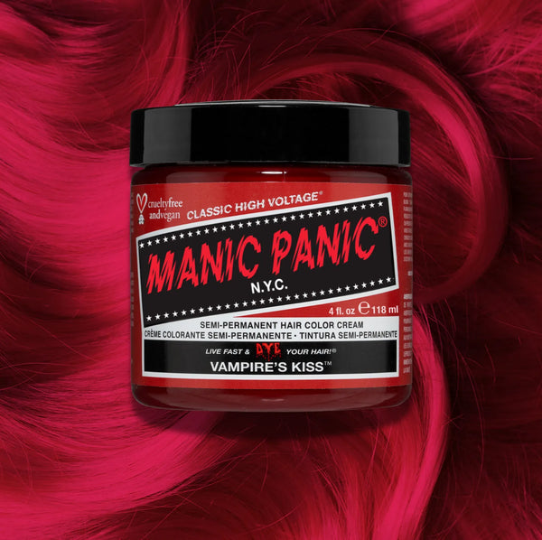 Manic Panic Classic High Voltage semi-permanent hair dye in shade Vampire's Kiss a vibrant, vegan hair color. Image shows a jar of Vampire's Kiss hair dye placed on top of a wavy red pink hair swatch.
