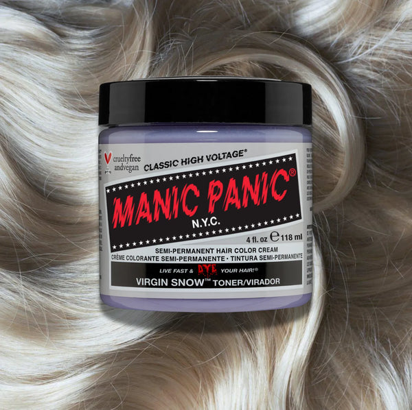 Manic Panic Classic High Voltage semi-permanent hair dye in shade Virgin Snow a vibrant, vegan hair color. Image shows a jar of Virgin Snow hair dye placed on top of a wavy platinum blonde hair swatch.

