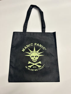 Black  In Glam We Trust Manic Panic reusable tote bag with Skully logo in varying colors