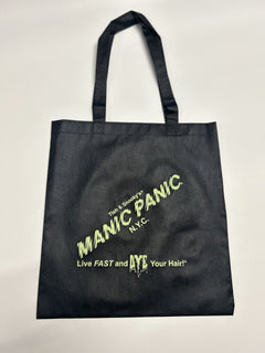 Black  In Glam We Trust Manic Panic reusable tote bag with Skully logo in varying colors