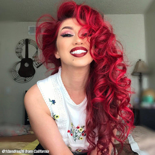 Model with long, curly Vampire Red hair. 